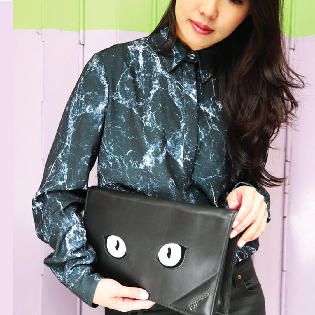 Black cat eye clutch bag